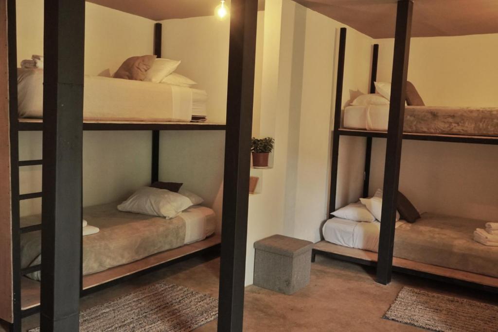Postel nebo postele na pokoji v ubytování OutBox Inn