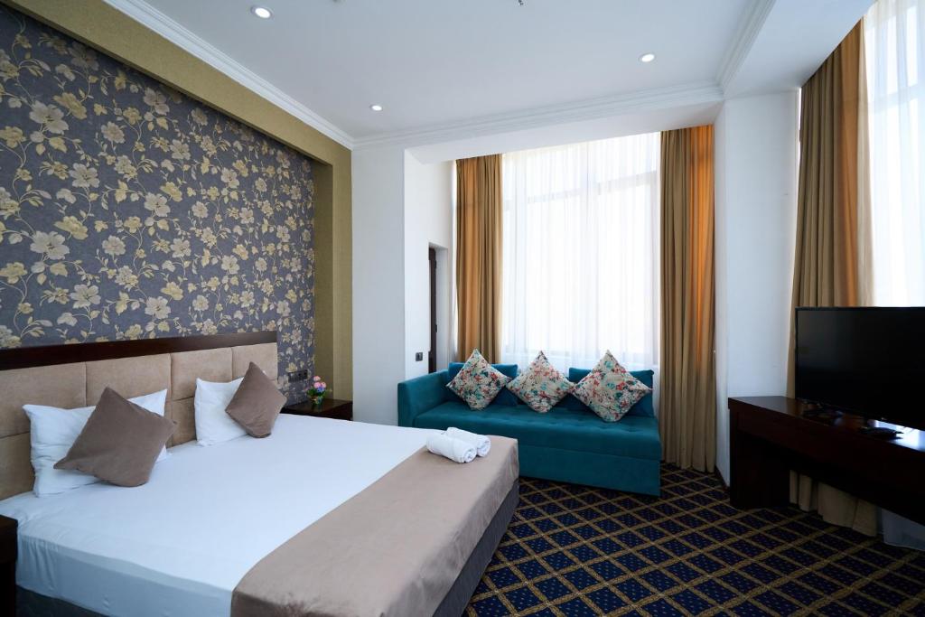 Letto o letti in una camera di Corniche City Inn