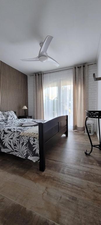 A bed or beds in a room at Apartamento Milka Gandia Marchuquera