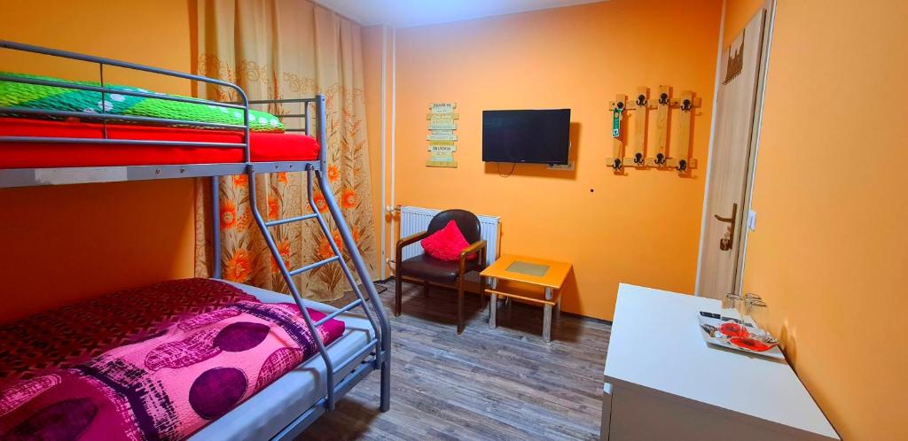 Postel nebo postele na pokoji v ubytování Hotel garni Am Hochwald