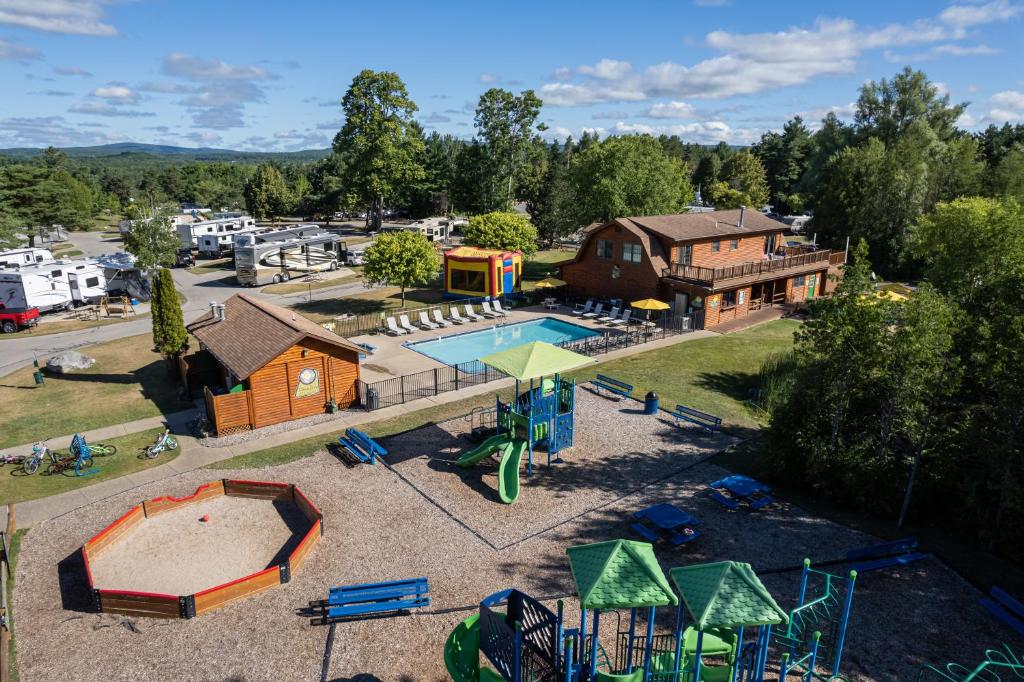 an aerial view of a park with a playground at Jellystone Park TM Petoskey in Petoskey