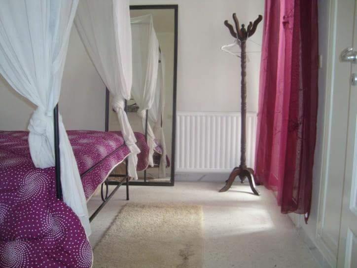 Postel nebo postele na pokoji v ubytování JARDIN Apartments