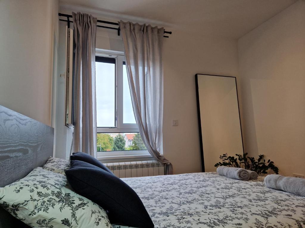 Postel nebo postele na pokoji v ubytování Studio mini54