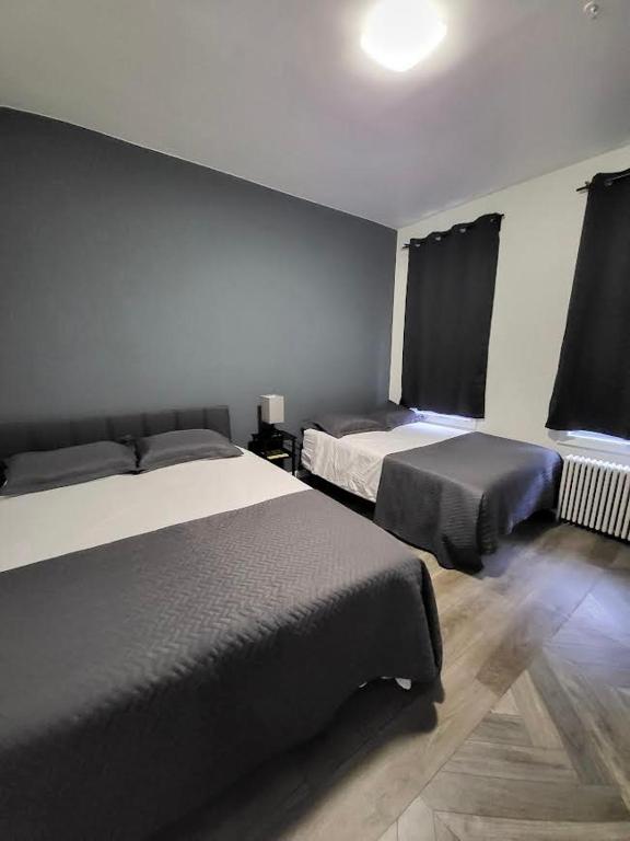 Postel nebo postele na pokoji v ubytování Shefah Hotel