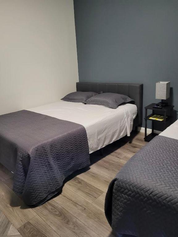 Postel nebo postele na pokoji v ubytování Shefah Hotel