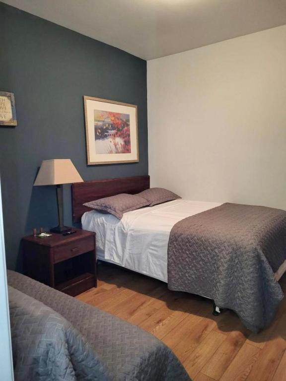 Postel nebo postele na pokoji v ubytování Shefah Hotel