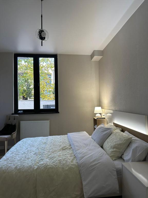 Postel nebo postele na pokoji v ubytování LARDA TBILISI