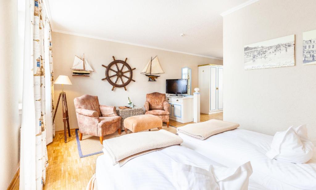 Postel nebo postele na pokoji v ubytování Hotel Friese-up AnnerSiet-