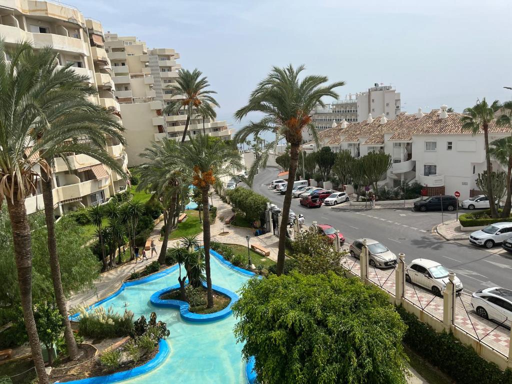 an aerial view of a street with palm trees at Stefys beach in Benalmádena