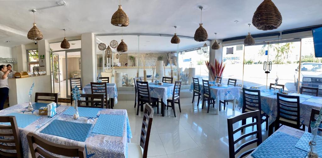 Restaurace v ubytování Hotel Playa de Oro - Enfrente de WTC y Plazas Comerciales