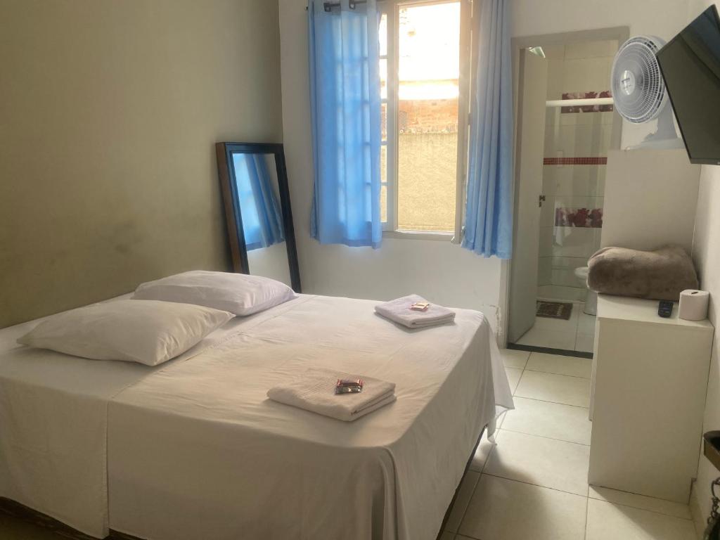 Postel nebo postele na pokoji v ubytování Hotel Real Centro