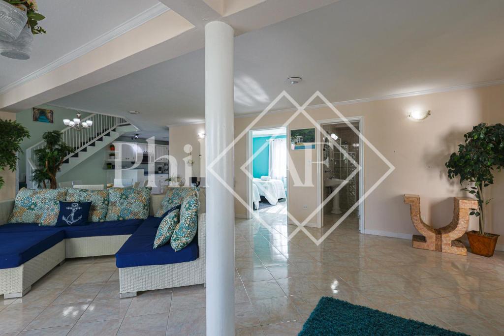 Posezení v ubytování Spacieux Duplex de 3 chambres à Gd Case