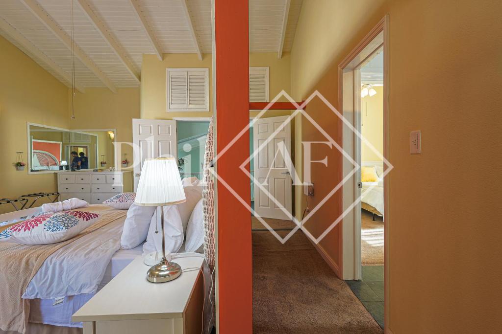 Postel nebo postele na pokoji v ubytování Spacieux Duplex de 3 chambres à Gd Case