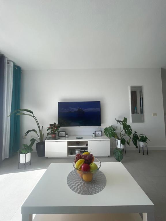 A television and/or entertainment centre at Royal View Apartment - Playa de Las Americas