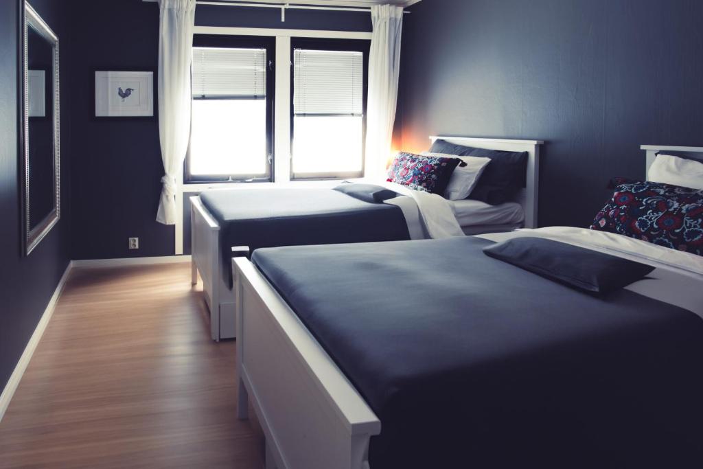 Ένα ή περισσότερα κρεβάτια σε δωμάτιο στο SBC Guest House