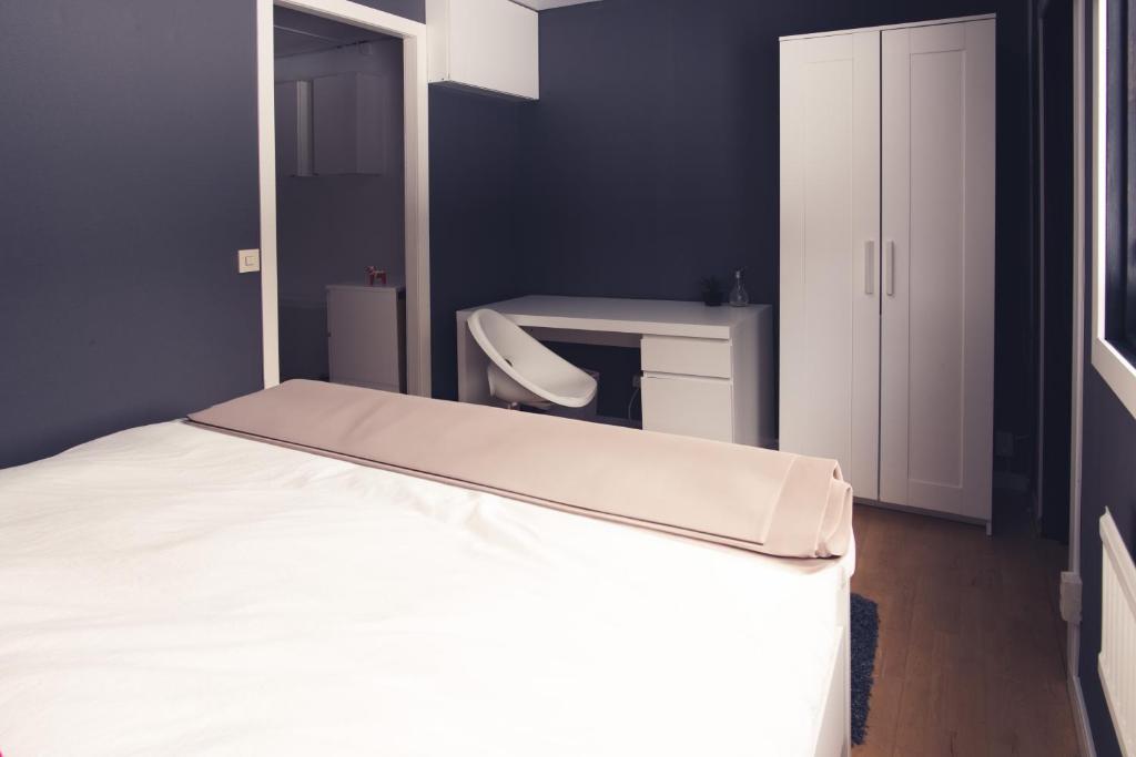 Postel nebo postele na pokoji v ubytování SBC Guest House