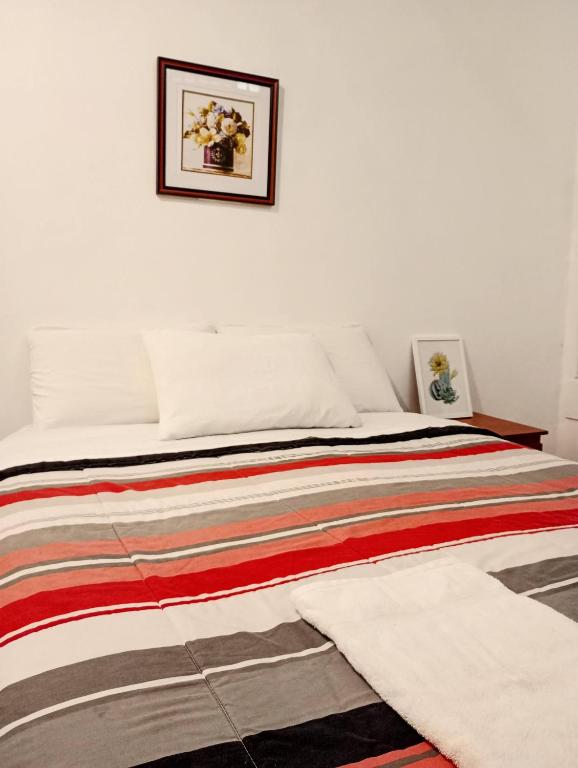 Cama o camas de una habitación en Samanai Wasi Hostel