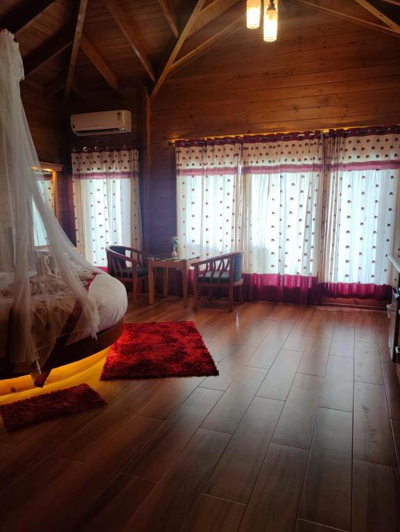 Posezení v ubytování LakeRose Wayanad Resort