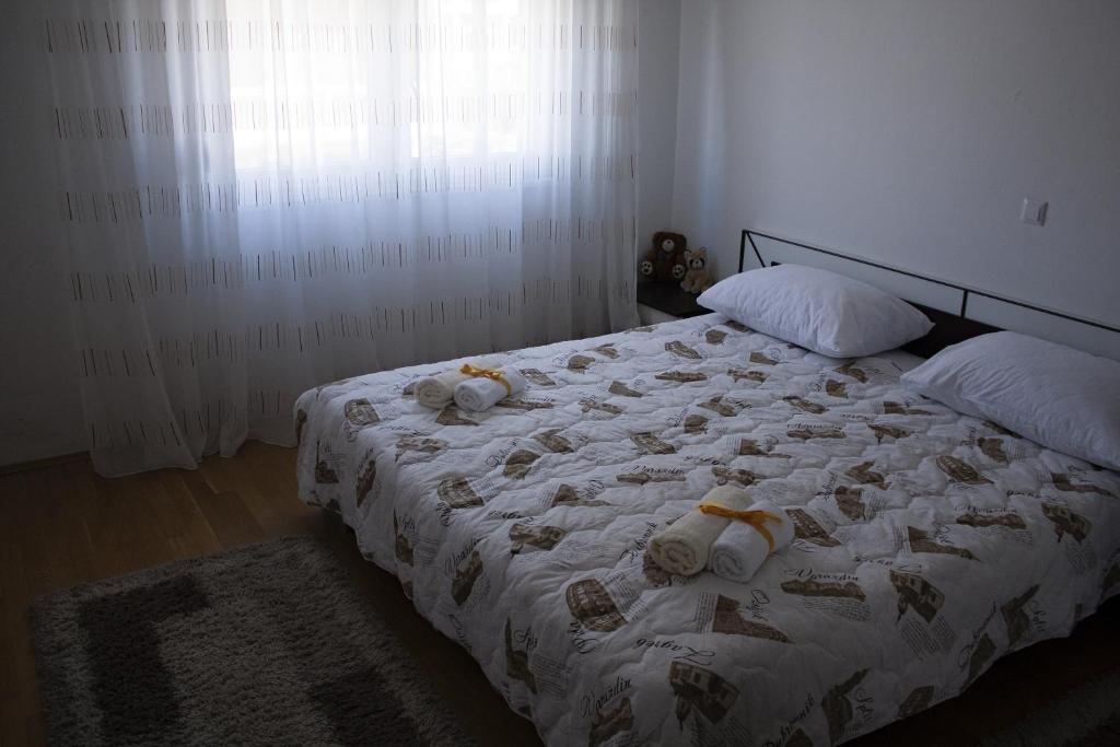 Postel nebo postele na pokoji v ubytování Apartment Visoka