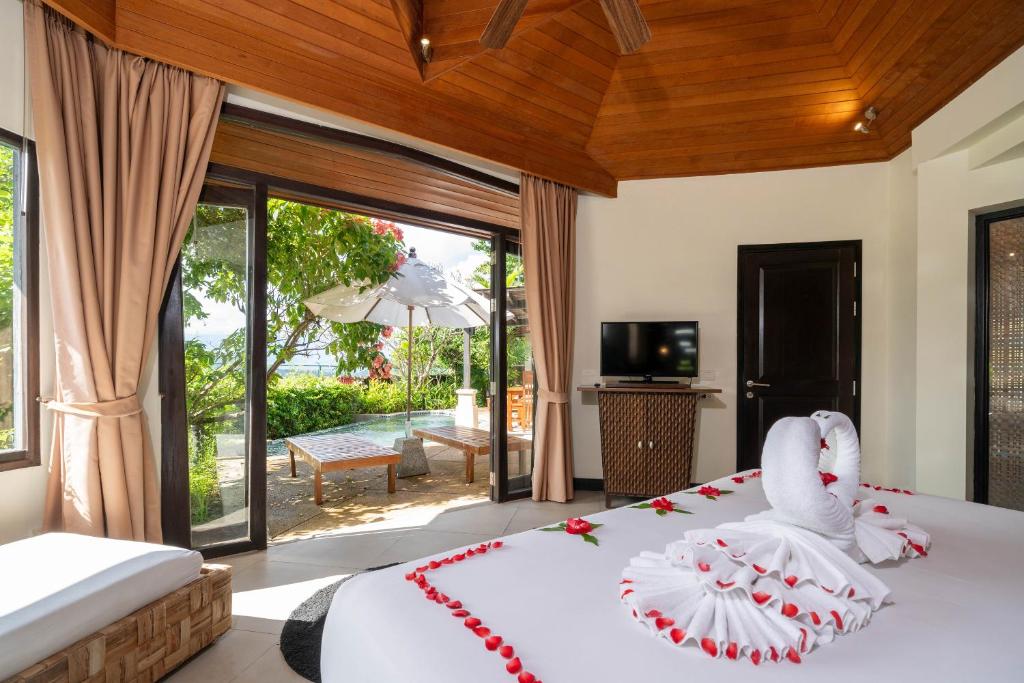 Postel nebo postele na pokoji v ubytování Indochine Resort and Villas - SHA Extra Plus