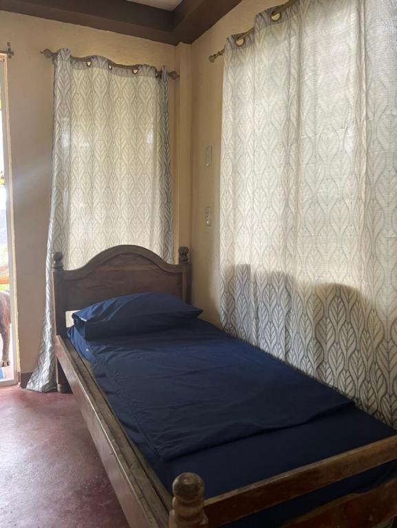 Postel nebo postele na pokoji v ubytování Boochee Beach