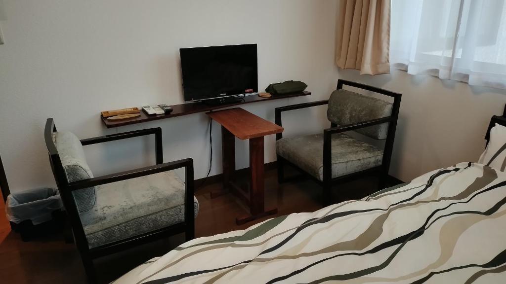 TV a/nebo společenská místnost v ubytování Guest house Kotone KYOTO