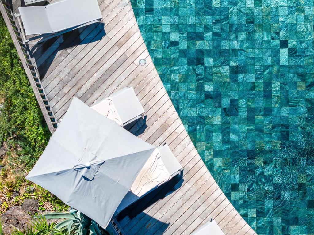 Bazén v ubytování Hotel Le Boucan Canot nebo v jeho okolí