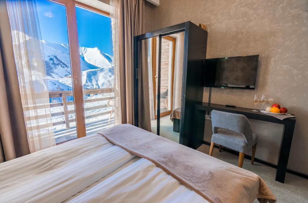 Postel nebo postele na pokoji v ubytování Hotel GoodAura