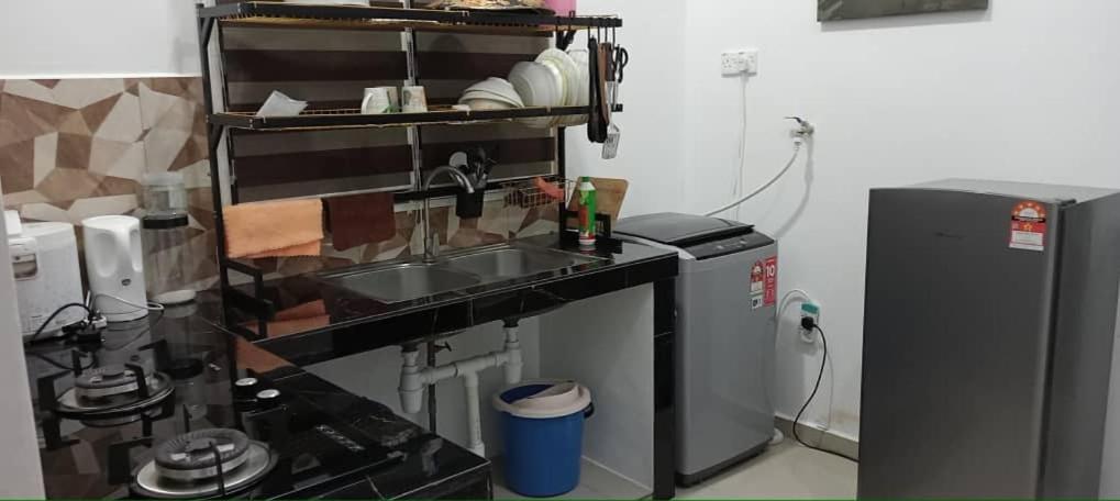 Kuchyň nebo kuchyňský kout v ubytování D'NAS HOMESTAY - Muslm Only