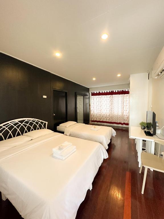 Gambar di galeri bagi White Lodge Hotel Bangkok di Bangkok