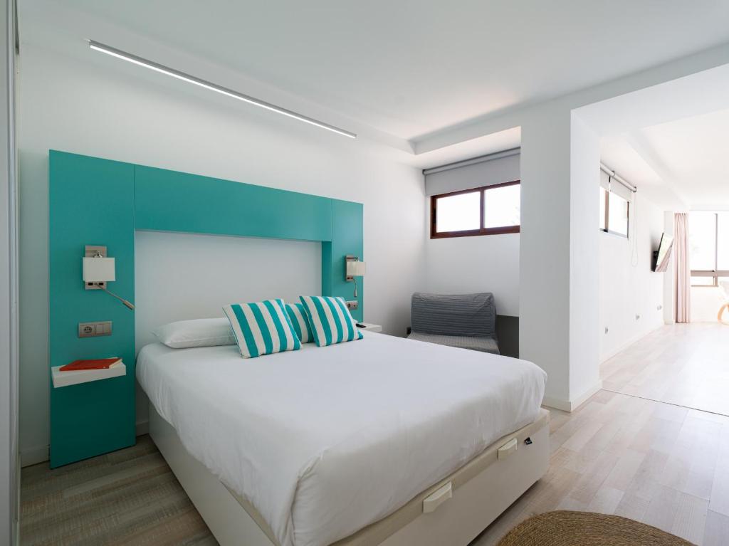 Posteľ alebo postele v izbe v ubytovaní Aguila Beach Ocean View By CanariasGetaway
