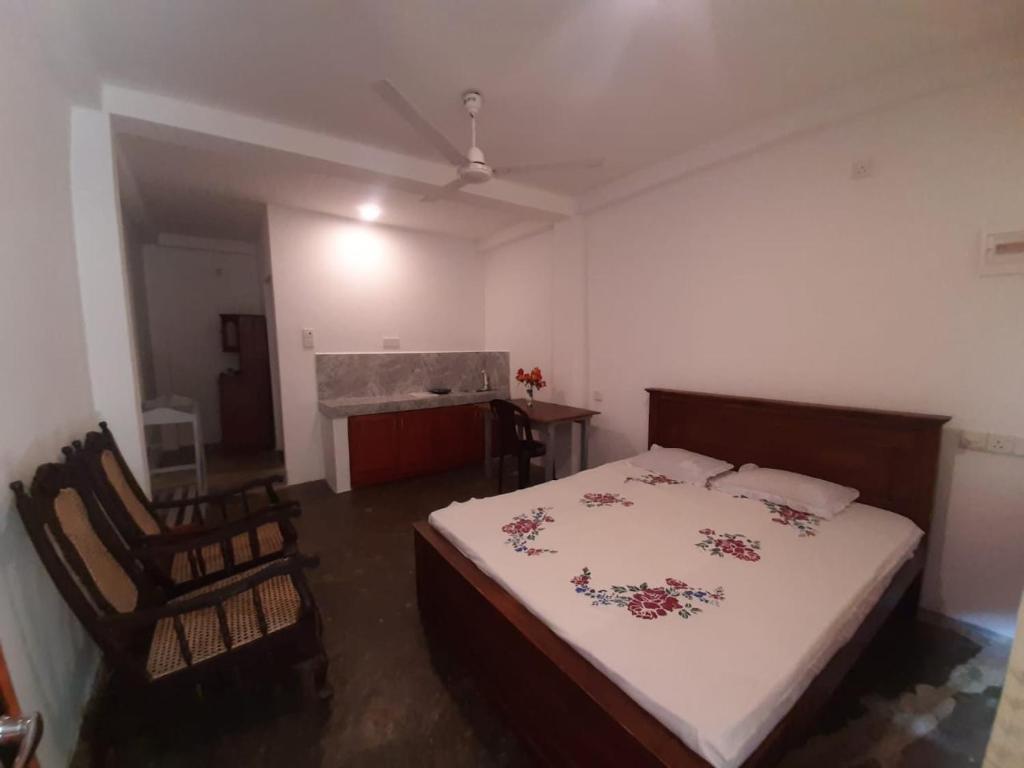 Cama o camas de una habitación en Royal Villa