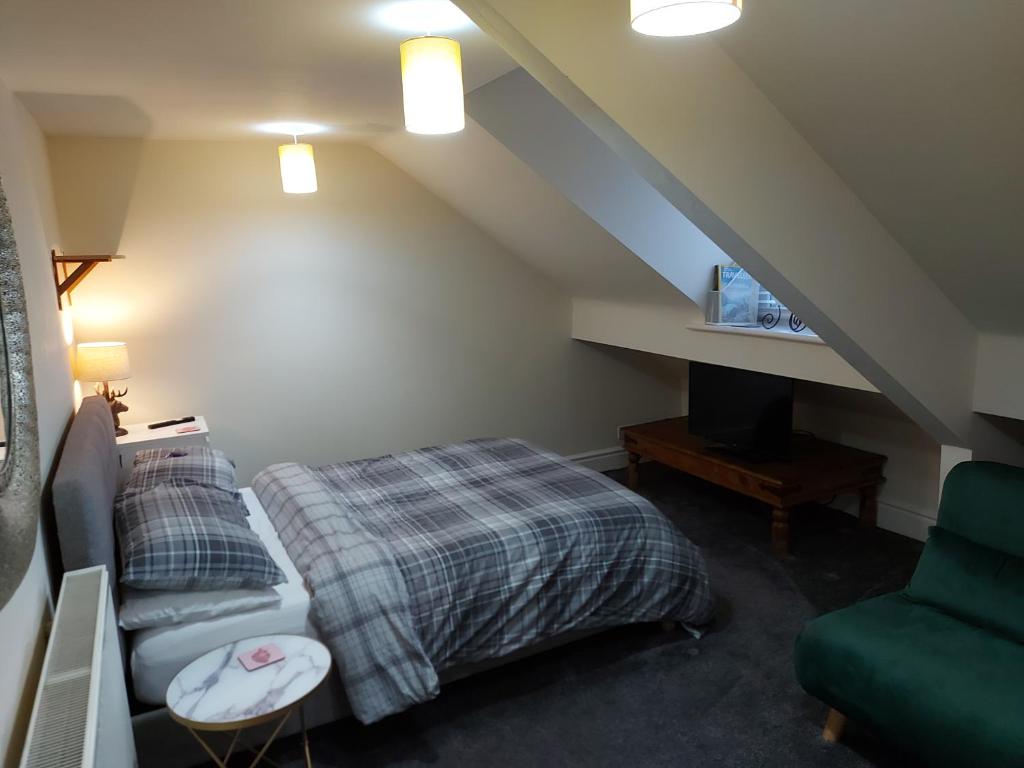 Una cama o camas en una habitación de Edwardian House