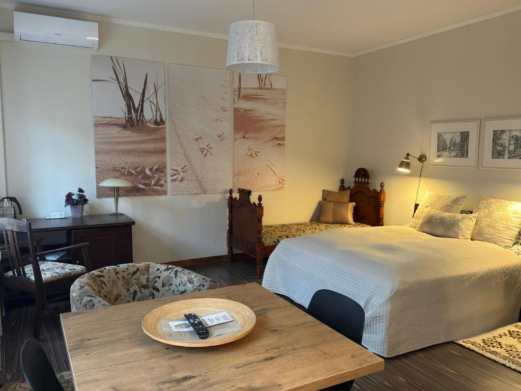 Postel nebo postele na pokoji v ubytování Hotel Vilhelmine