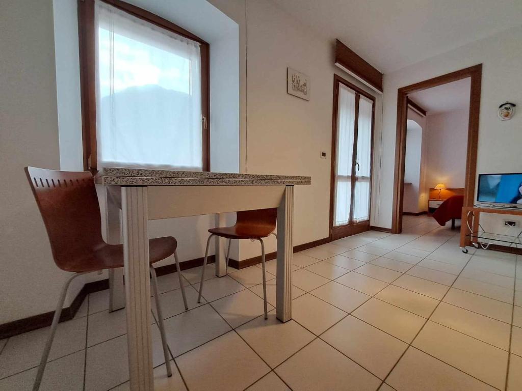 TV a/nebo společenská místnost v ubytování Albergo Martina