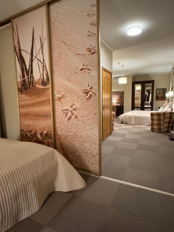 Postel nebo postele na pokoji v ubytování Hotel Vilhelmine