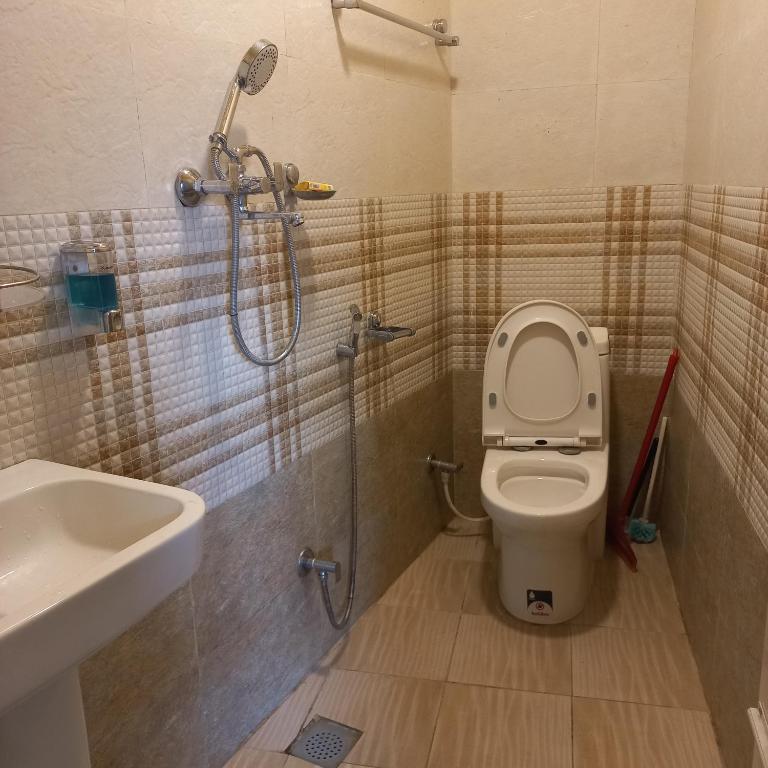 Koupelna v ubytování KAJI HOME