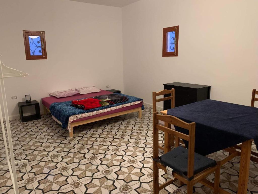 Postel nebo postele na pokoji v ubytování Castello Bianco