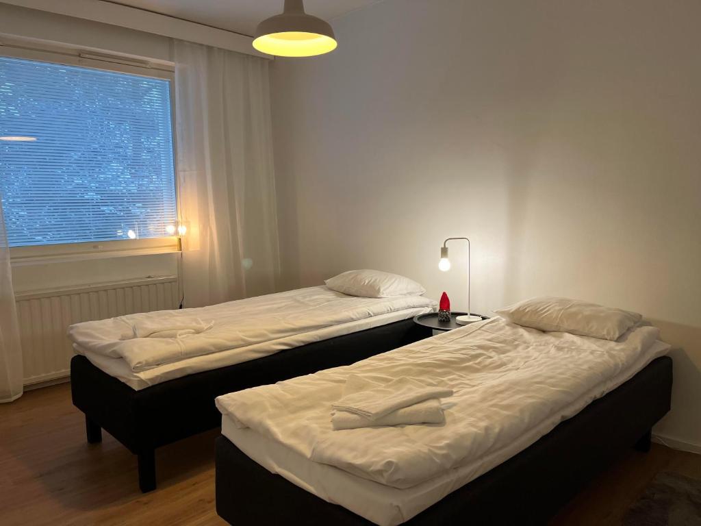 Postel nebo postele na pokoji v ubytování Inka Apartments