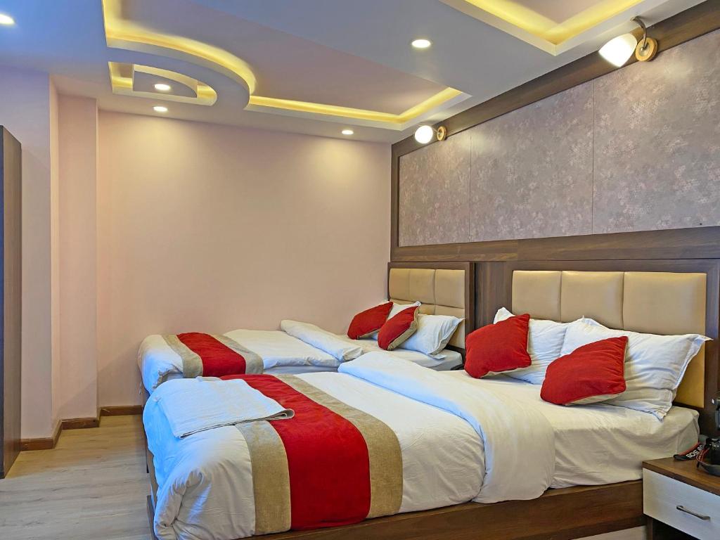 Postel nebo postele na pokoji v ubytování Hotel White Rabbit