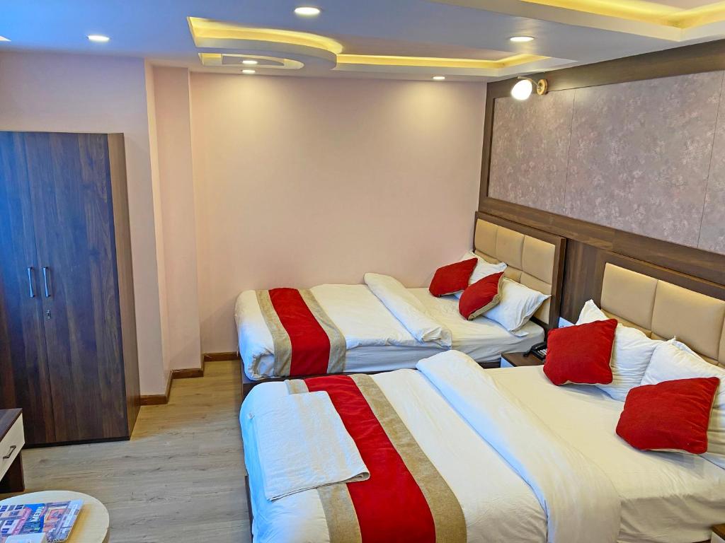 Postel nebo postele na pokoji v ubytování Hotel White Rabbit