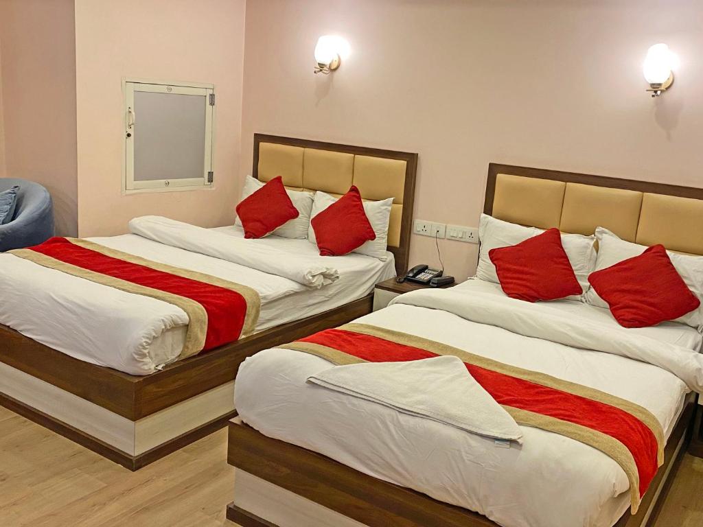 Postel nebo postele na pokoji v ubytování Hotel White Rabbit