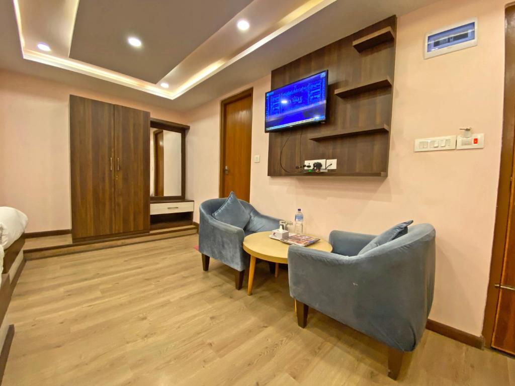 TV a/nebo společenská místnost v ubytování Hotel White Rabbit