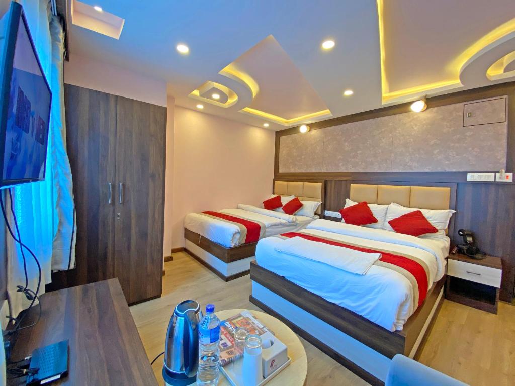 Postel nebo postele na pokoji v ubytování Hotel White Rabbit