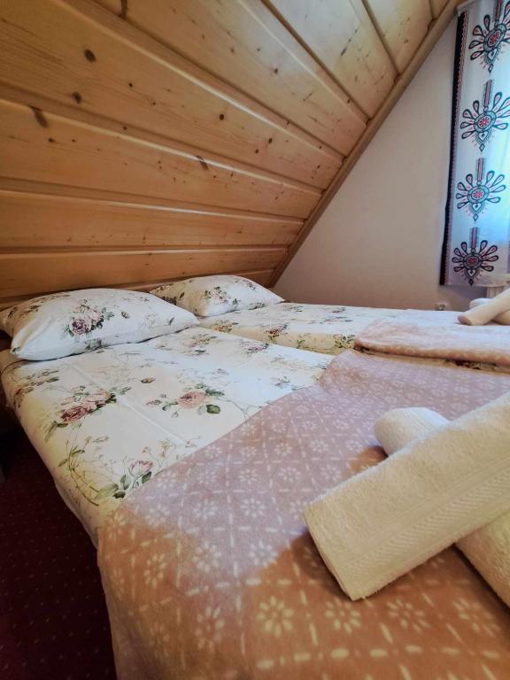 Posteľ alebo postele v izbe v ubytovaní U Chowańców