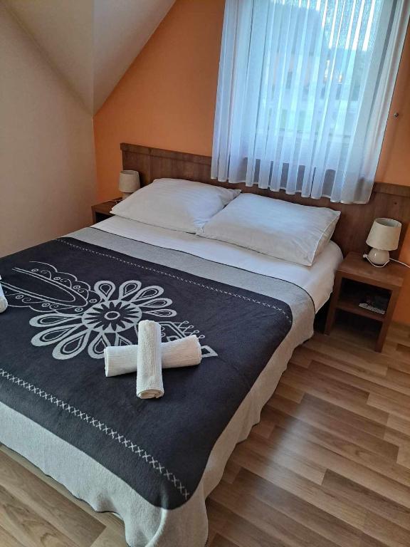 Posteľ alebo postele v izbe v ubytovaní U Chowańców