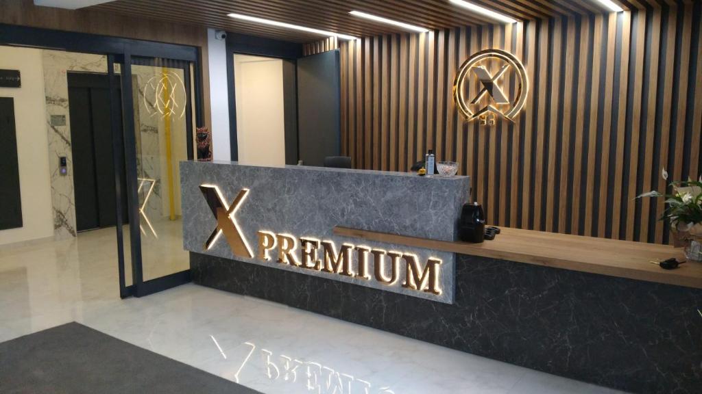 a gym lobby with a sign that reads permium at X Premium in Kayseri