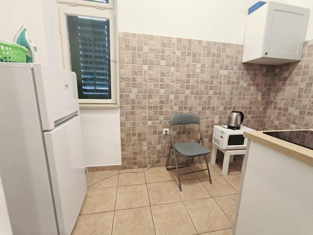 Kuchyňa alebo kuchynka v ubytovaní Apartment Sole Macula