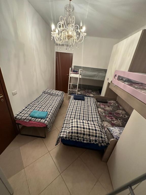 Postel nebo postele na pokoji v ubytování Gigli, rooms con cucina in comune e terrazza