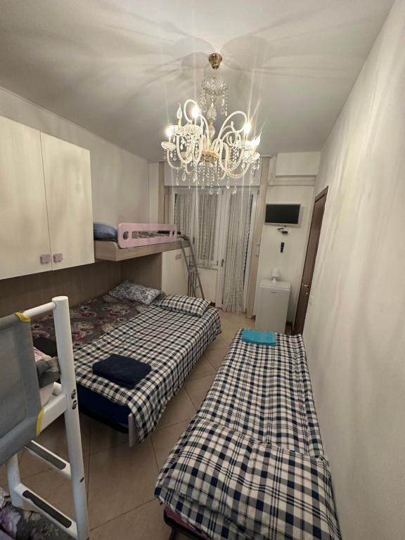 Postel nebo postele na pokoji v ubytování Gigli, rooms con cucina in comune e terrazza